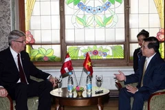 Chủ tịch nước Nguyễn Minh Triết gặp Tổng thống Latvia Valdis Zatlers sang dự lễ kỷ niệm. (Ảnh: Nguyễn Khang/TTXVN) 