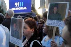 Tại lễ tưởng niệm các nạn nhân vụ khủng bố 11/9 ở khu vực Trung tâm Thương mại Thế giới, New York ngày 11/9. (Nguồn: AFP/TTXVN)