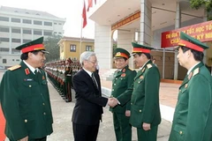 Tổng Bí thư Nguyễn Phú Trọng với cán bộ, giảng viên của Học viện. (Ảnh: Trí Dũng/TTXVN)