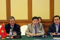 Thứ trưởng Ngoại giao Phạm Quang Vinh và đoàn Việt Nam tại Diễn đàn AMF-4. (Ảnh: Kim Dung-Chí Giáp/Vietnam+)