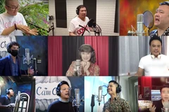 Các nghệ sỹ tham gia MV “Việt Nam ơi, cùng nhau đồng lòng.” (Ảnh: PV/Vietnam+) 
