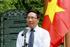 Phó Thủ tướng, Bộ trưởng Ngoại giao Phạm Bình Minh phát biểu tại lễ kỷ niệm 70 năm Ngày thành lập ngành ngoại giao. (Ảnh: Văn Tý/TTXVN)