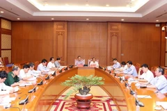 Đồng chí Lê Hồng Anh chủ trì cuộc họp Tiểu ban Tổ chức phục vụ Đại hội XII của Đảng. (Ảnh: Thống Nhất-TTXVN)