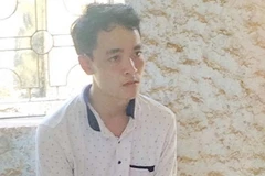 Đối tượng Hồ Chí Bảo tại cơ quan điều tra. (Ảnh: Hồ Cầu/TTXVN)