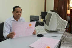 Yêu cầu các địa phương đẩy nhanh tiến độ cấp đổi sổ đỏ 