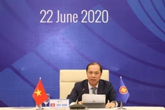 Thứ trưởng Bộ Ngoại giao Nguyễn Quốc Dũng chủ trì Hội nghị. (Ảnh: Văn Điệp/TTXVN)