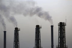 Một nhà máy điện tại thủ đô Baghdad, Iraq. (Ảnh: AFP/TTXVN)