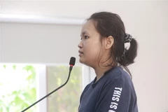 Bị cáo Phạm Thị Thiên Hà tại phiên tòa. (Ảnh: Huyền Trang/TTXVN)