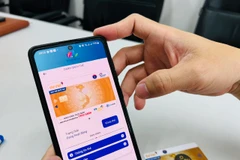 Ứng dụng mobile giúp người dùng trải nghiệm du lịch. (Ảnh: Mai Mai/Vietnam+)