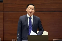 Phó Thủ tướng Chính phủ Trần Hồng Hà làm rõ các vấn đề liên quan và trả lời chất vấn của đại biểu Quốc hội. (Ảnh: An Đăng/TTXVN)
