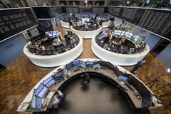 Giao dịch viên tại Sàn giao dịch chứng khoán Frankfurt am Main, miền tây Đức. (Nguồn: AFP/TTXVN)