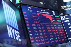 Bảng tỷ giá chứng khoán tại Sàn giao dịch New York, Mỹ. (Nguồn: THX/TTXVN)