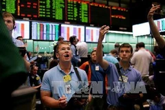Giao dịch giá dầu tại thị trường chứng khoán New York, Mỹ. (Ảnh: AFP/TTXVN)