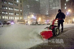 Tuyết ngập đường phố tại hạ Manhattan ngày 2/1. (Nguồn: AFP/TTXVN)