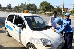 Thanh tra hoạt động taxi tại Hà Nội. Ảnh minh họa. (Ảnh: Thế Duyệt/TTXVN)