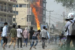 Xung đột leo thang tại Phnom Penh tháng 1/2014. (Nguồn: AFP/TTXVN)