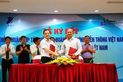 VNPT 'bắt tay' cùng VICEM. (Ảnh: T.H/Vietnam+)