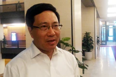 Phó Thủ tướng Chính phủ Phạm Bình Minh trả lời báo chí chiều 28/7. (Ảnh: T.H/Vietnam)