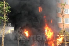 Vụ cháy khủng khiếp đã cướp đi sinh mạng của 13 người. (Ảnh: Vietnam+)