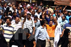 Biểu tình ủng hộ Tổng thống bị phế truất Mohamed Morsi ở Cairo. (Nguồn: THX/TTXVN)