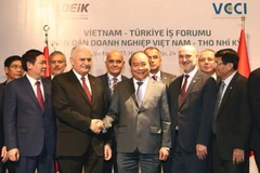 Thủ tướng Nguyễn Xuân Phúc và Thủ tướng Cộng hòa Thổ Nhĩ Kỳ Binali Yildirim đến dự Diễn đàn doanh nghiệp Việt Nam-Thổ Nhĩ Kỳ. (Ảnh: Thống Nhất/TTXVN)