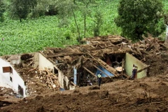  Hiện trường vụ lở đất ở San Pedro Soloma ngày 20/6. (Nguồn: AFP/TTXVN)
