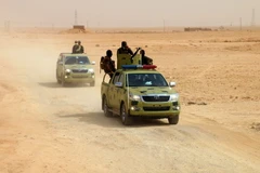  Các lực lượng Iraq trong chiến dịch chống IS tại làng Anna, tỉnh Anbar ngày 20/9. (Nguồn: AFP/TTXVN)