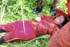 Người phụ nữ may mắn được cứu sống khỏi bàn tay của từ thần sau khi bị ném xuống sông. (Nguồn: Bernama)