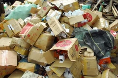 Tang vật được cơ quan chức năng thu giữ và tiêu hủy. (Ảnh: Mạnh Linh/TTXVN)