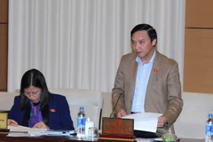 Chủ nhiệm Ủy ban Pháp luật của Quốc hội Nguyễn Khắc Định phát biểu ý kiến. (Ảnh: An Đăng/TTXVN)