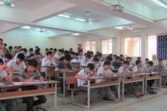 Thí sinh dự thi đại học năm 2011. (Ảnh: Phạm Mai/Vietnam+)