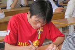 Thí sinh tại Hội đồng thi Cao đẳng Giao thông vận tải. (Ảnh: Phạm Mai/Vietnam+).