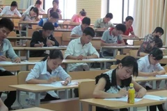 Thí sinh dự thi đại học tại Học viện Hành chính. (Ảnh: Phạm Mai/Vietnam+).