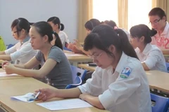 Thí sinh dự thi đại học năm 2011. (Ảnh: Phạm Mai/Vietnam+)