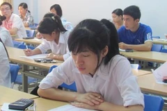 Thí sinh dự thi tại Đại học Hà Nội. (Ảnh: Phạm Mai/Vietnam+)