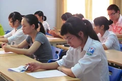 Thí sinh dự thi đại học năm 2011. (Ảnh: Phạm Mai/Vietnam+)