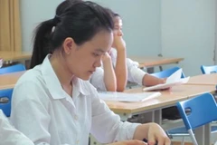 Thí sinh dự thi tại Hội đồng thi Đại học Hà Nội.(Ảnh: Phạm Mai/Vietnam+).