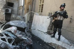 Binh sỹ Iraq gác tại hiện trường của một vụ tấn công. (Ảnh: AFP/TTXVN)