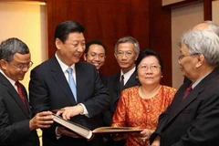 Phó Chủ tịch Trung Quốc Tập Cận Bình trong chuyến thăm Lào. (Ảnh: Xinhua)