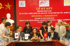 Quanh cảnh buổi lễ ký kết. (Ảnh: PV/TTXVN)