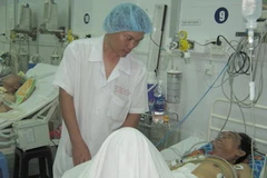 Bệnh nhân Việt đã tỉnh và phục hồi tốt sau khi phẫu thuật. (Ảnh: Thanh Sang/Vietnam+)