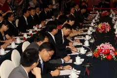 Các đại biểu tham dự vòng đàm phán. (Ảnh: Xinhua)