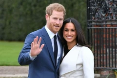 Hoàng tử Harry cùng vợ Meghan Markle. (Nguồn: pagesix)