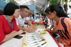 Học viện Tài chính tư vấn xét tuyển tại Ngày hội Tư vấn xét tuyển Đại học, Cao đẳng năm 2019. (Ảnh: Anh Tuấn/TTXVN)