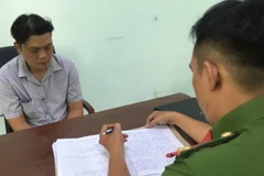 Đối tượng Sơn tại cơ quan điều tra. (Ảnh: TTXVN phát)