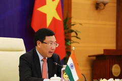 Phó Thủ tướng, Bộ trưởng Bộ Ngoại giao Phạm Bình Minh phát biểu tại Kỳ họp lần thứ 17 Ủy ban Hỗn hợp Việt Nam-Ấn Độ. (Ảnh: Lâm Khánh/TTXVN)