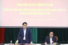 Phó Bí thư Thành ủy, Chủ tịch Ủy ban Nhân dân thành phố Hà Nội Nguyễn Đức Chung phát biểu chỉ đạo tại cuộc làm việc với lãnh đạo quận Nam Từ Liêm. (Ảnh: Văn Điệp/TTXVN)
