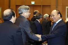 Thủ tướng Nguyễn Xuân Phúc gặp mặt đại biểu trí thức, nhà khoa học, văn nghệ sỹ. (Ảnh: Thống Nhất/TTXVN)