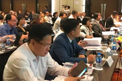 Công bố Báo cáo Thường niên Kinh tế Việt Nam 2018, với tựa đề “Hiểu thị trường lao động để tăng năng suất,” ngày 8/5. (Ảnh: PV/Vietnam+)