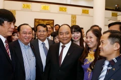 Thủ tướng Nguyễn Xuân Phúc với các đại biểu. (Ảnh: Thống Nhất/TTXVN)